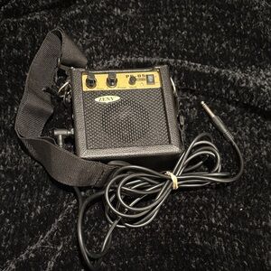 Black Portable Speaker with Gold Accents